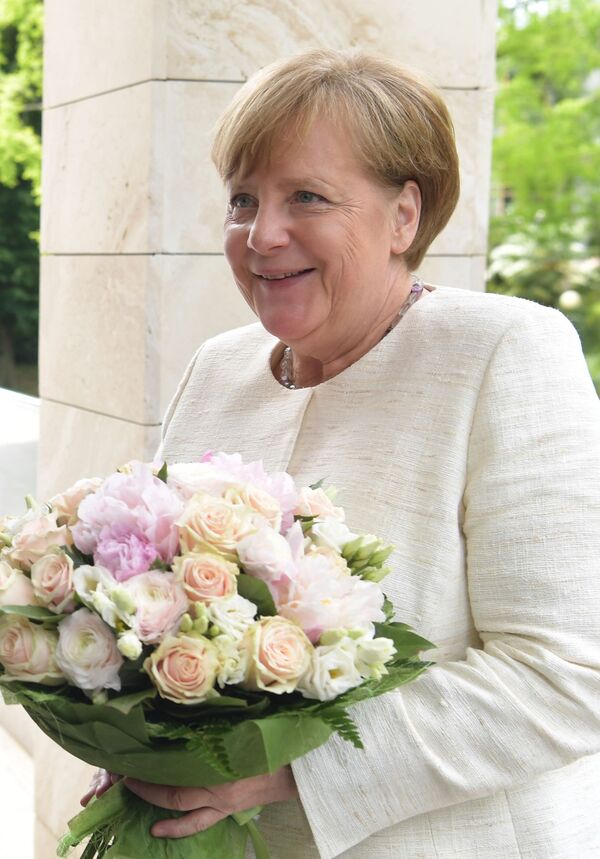 Ангела Меркель во время встречи с президентом РФ Владимиром Путиным в Сочи - Sputnik Lietuva