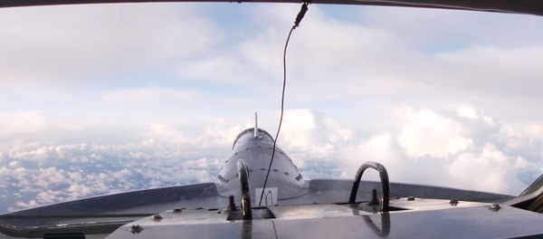 Nufilmuotas Tu-142 skrydis virš Arkties vandenyno Nufilmuotas Tu-142 skrydis virš Arkties vandenyno - Sputnik Lietuva