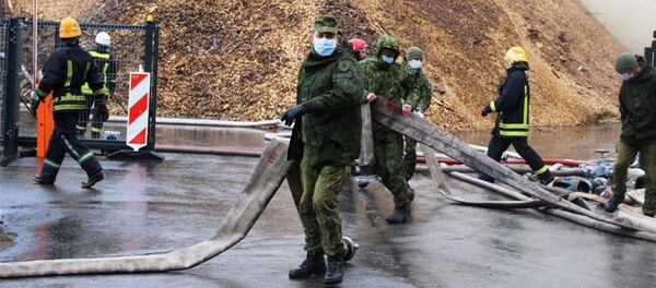 Тушение пожара в Радвилишкис Тушение пожара в Радвилишкис - Sputnik Lietuva