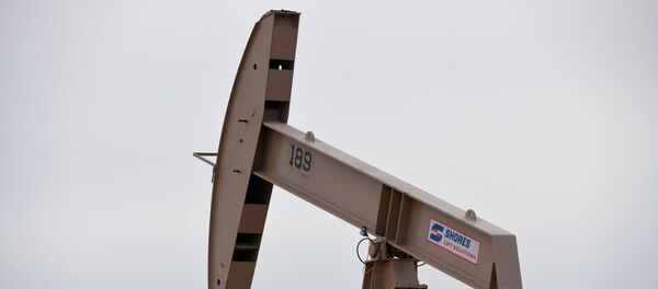 Добыча нефти в области около Одессы, Техас, США Добыча нефти в области около Одессы, Техас, США - Sputnik Литва