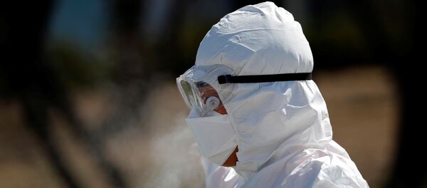 Медработник во время карантина в Южной Корее, 14 марта 2020 года - Sputnik Литва