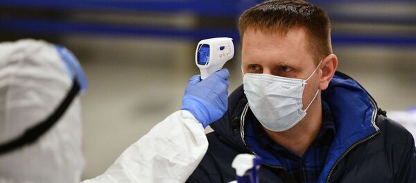 Усиление санитарного контроля в аэропорту Внуково в связи с коронавирусом Усиление санитарного контроля в аэропорту Внуково в связи с коронавирусом - Sputnik Литва