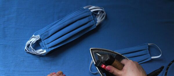 Пошив многоразовых масок для сотрудников трамвайного депо, архивное фото - Sputnik Литва