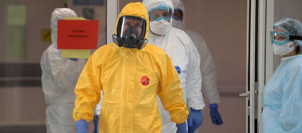 Vladimiras Putinas Komunarkos ligoninėje, kovo 24  d. - Sputnik Lietuva