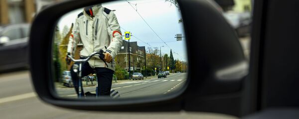 Велосипедист на улице, архивное фото - Sputnik Литва