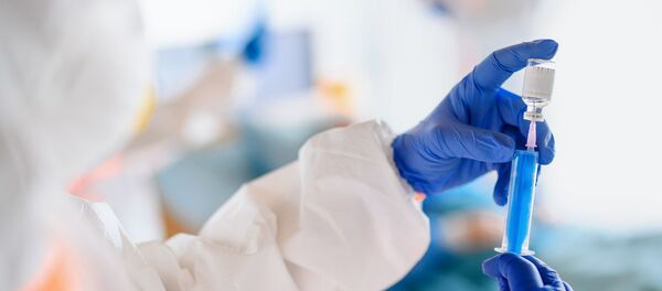 Медперсонал в больнице в защитной экипировке, архивное фото - Sputnik Литва