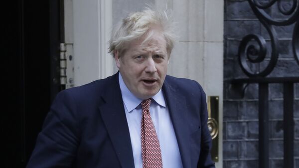 Премьер-министр Великобритании Борис Джонсон, 25 марта 2020 года  - Sputnik Lietuva