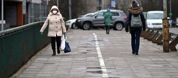 Прохожие на улице Вильнюса Прохожие на улице Вильнюса - Sputnik Lietuva