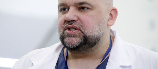 Главврач Коммунарки Денис Проценко - Sputnik Литва