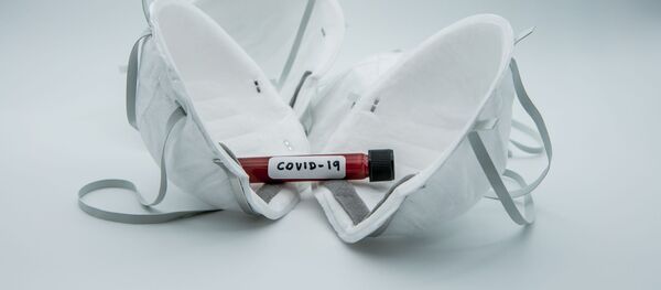 Защитные маски и тест на коронавирус - Sputnik Литва