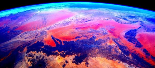 Снимок Земли из космоса, сделанный астронавтом Скоттом Келли с борта МКС - Sputnik Литва