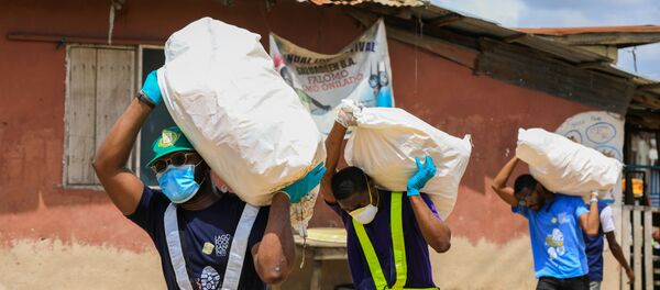 Savanoriai pristato maisto siuntinius Laose Savanoriai pristato maisto siuntinius Laose - Sputnik Lietuva