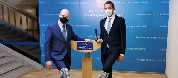 Sveikatos apsaugos ministras Aurelijus Veryga ir energetikos ministras Žygimantas Vaičiūnas Sveikatos apsaugos ministras Aurelijus Veryga ir energetikos ministras Žygimantas Vaičiūnas - Sputnik Lietuva