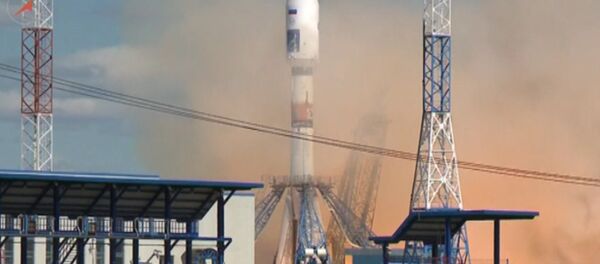 СПУТНИК_Кадры первого запуска ракеты со спутниками с космодрома "Восточный" СПУТНИК_Кадры первого запуска ракеты со спутниками с космодрома "Восточный" - Sputnik Литва