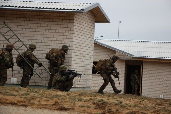 Операция на военно-тренировочном комплексе Битва в городе в ходе международных учений Балтийская пиранья – 2016 Операция на военно-тренировочном комплексе Битва в городе в ходе международных учений Балтийская пиранья – 2016 - Sputnik Литва