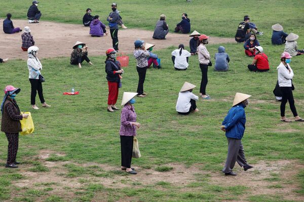 Su kariniais šūkiais ir be jokių aukų. Kuri šalis nugalėjo COVID-19 - Sputnik Lietuva