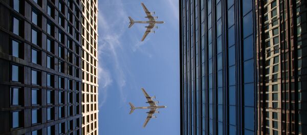 Стратегические бомбардировщики-ракетоносцы Ту-95МС во время воздушной части военного парада Стратегические бомбардировщики-ракетоносцы Ту-95МС во время воздушной части военного парада - Sputnik Lietuva