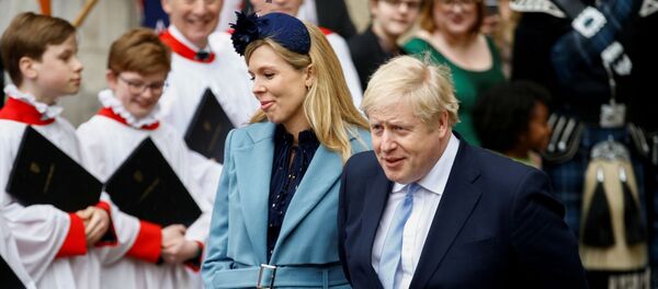 Премьер Британии Борис Джонсон и его невеста Кэрри Саймондс, 9 марта 2020 года Премьер Британии Борис Джонсон и его невеста Кэрри Саймондс, 9 марта 2020 года - Sputnik Lietuva