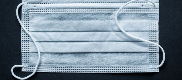 Одноразовая защитная медицинская маска Одноразовая защитная медицинская маска - Sputnik Lietuva