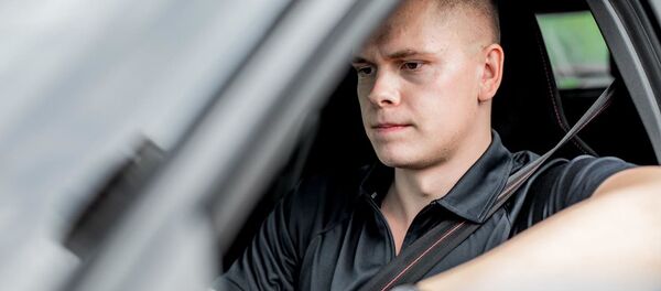 Литовский пловец Данас Рапшис за рулем Литовский пловец Данас Рапшис за рулем - Sputnik Lietuva