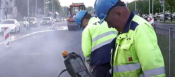 Асфальтирование проспекта Лайсвес в Вильнюсе - Sputnik Lietuva