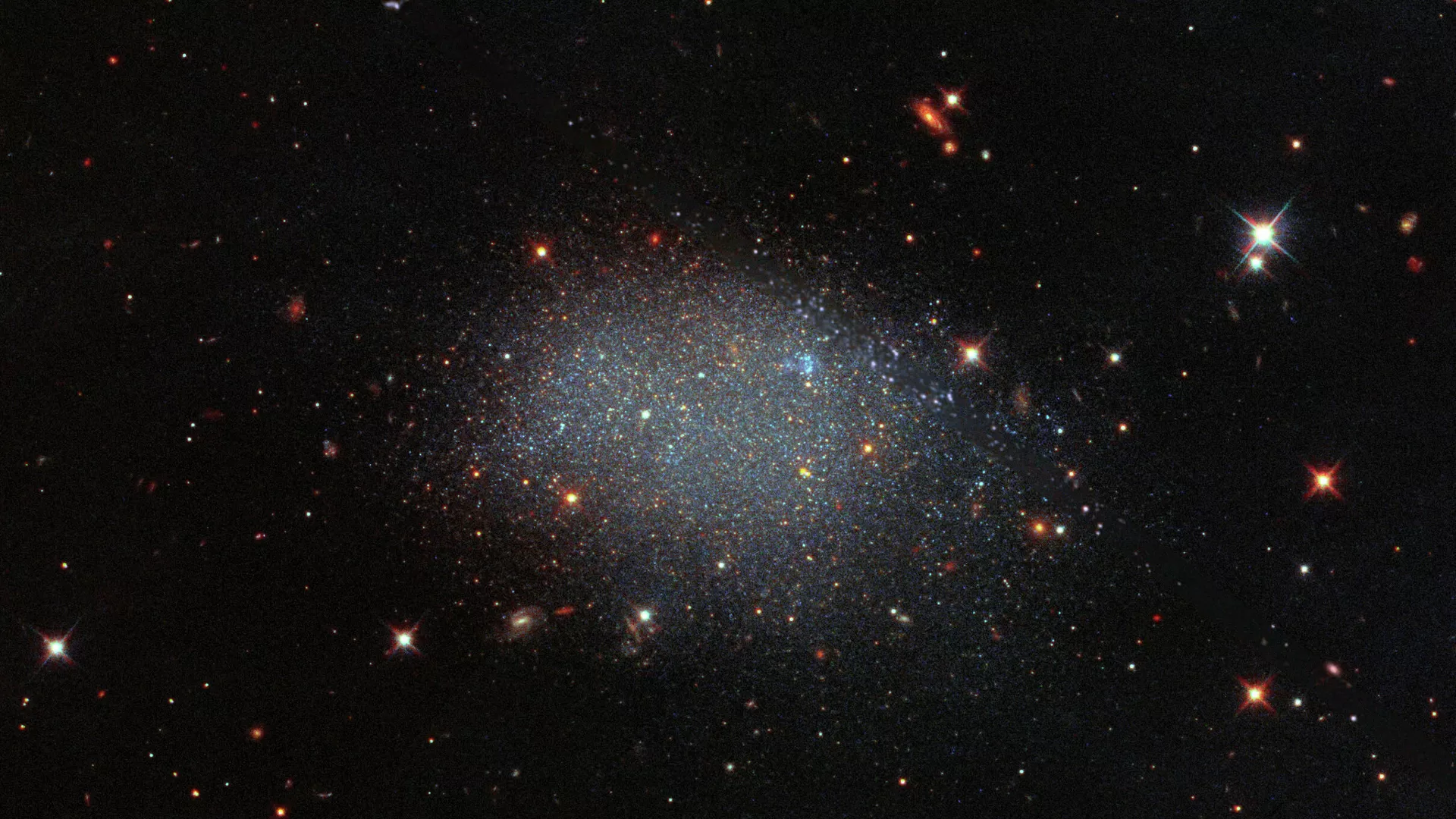Карликовая галактика KK 246, также известная как ESO 461−036