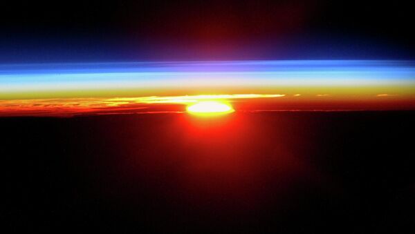 Закат солнца с борта Международной космической станции - Sputnik Lietuva
