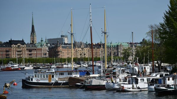 Лодки на причале в городе Стокгольм, архивное фото - Sputnik Литва