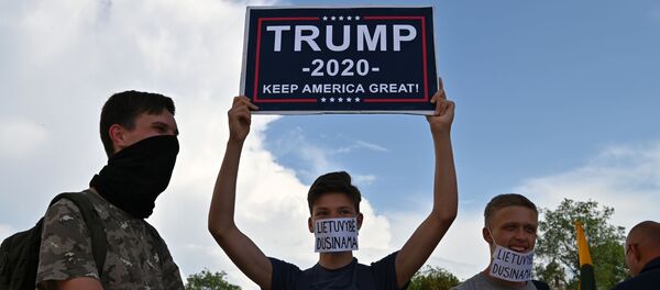Шествие в поддержку законно избранного Президента США Дональда Трампа Шествие в поддержку законно избранного Президента США Дональда Трампа - Sputnik Литва