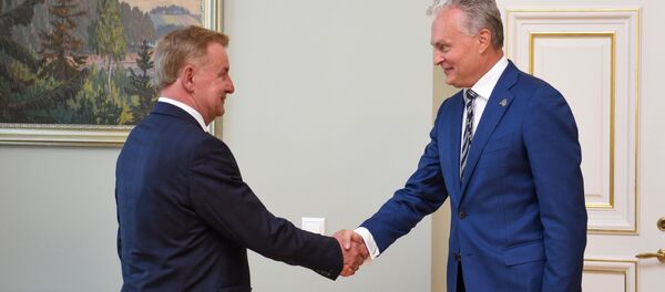Президент Литвы Гитанас Науседа на встрече с кандидатом на пост министра экономики и инноваций Римантасом Синкявичюсом - Sputnik Литва