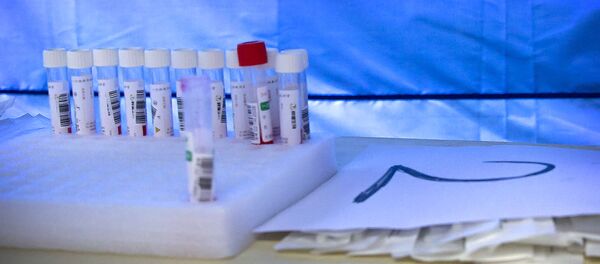 Тест на коронавирус, архивное фото Тест на коронавирус, архивное фото - Sputnik Литва