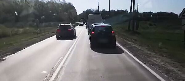 Полиция Литвы показала на видео, как водители нарушают ПДД на железнодорожных путях Полиция Литвы показала на видео, как водители нарушают ПДД на железнодорожных путях - Sputnik Lietuva