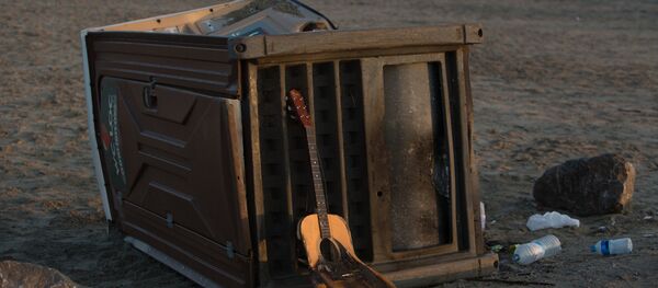 Продолжается расселение стихийного лагеря беженцев в Кале во Франции - Sputnik Литва