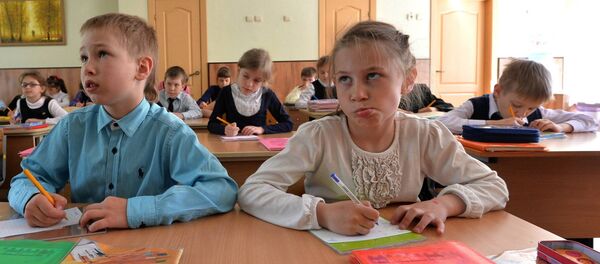 Дети на уроке Дети на уроке - Sputnik Lietuva