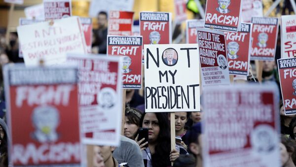 Протест против нового президента Трампа в Вашингтоне - Sputnik Литва