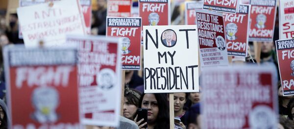 Протест против нового президента Трампа в Вашингтоне - Sputnik Литва