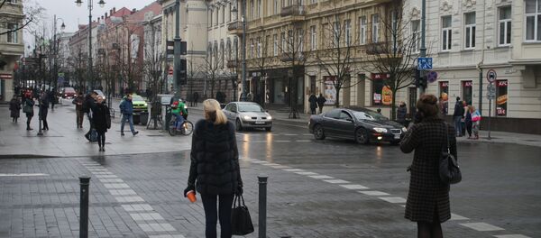 Пешеходы на перекрестке Кафедральной площади и проспекта Гедиминаса - Sputnik Lietuva