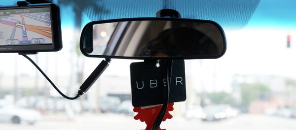 Карточка Uber в машине Карточка Uber в машине - Sputnik Lietuva