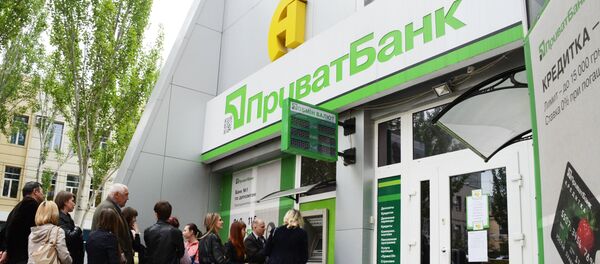 ПриватБанкприостановил работу в Донецкой и Луганской областях - Sputnik Lietuva