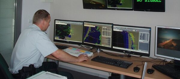 Сотрудник береговой охраны Службы охраны государственной границы - Sputnik Литва