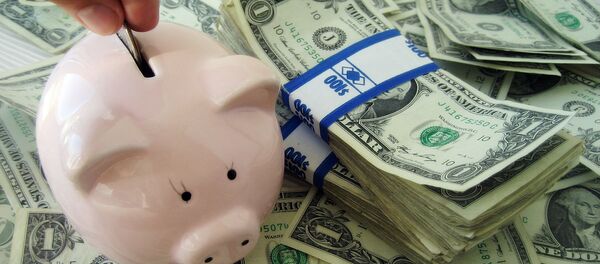 Свинка-копилка и доллары Свинка-копилка и доллары - Sputnik Lietuva