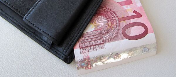 Кошелек с евро Кошелек с евро - Sputnik Литва