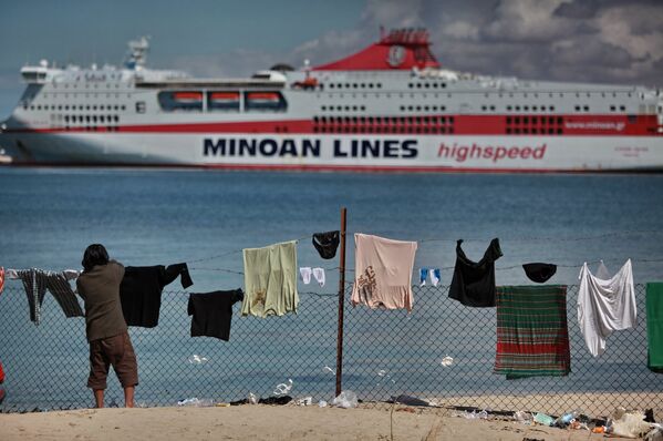 Беженцы в порту Бенгази - Sputnik Lietuva