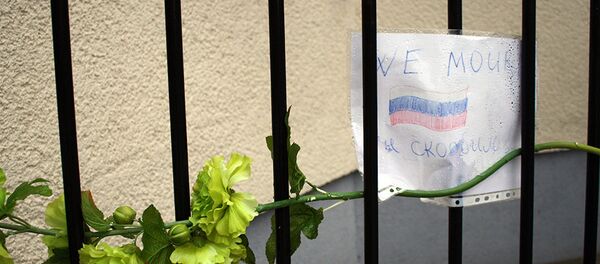 Жители Литвы скорбят вместе с Россией о погибших в теракте - Sputnik Литва