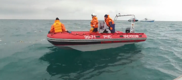 Поиск обломков и осмотр места крушения - спасатели продолжают операцию по Ту-154 - Sputnik Литва