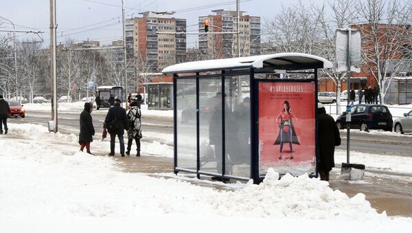 Остановка общественного транспорта зимой - Sputnik Lietuva