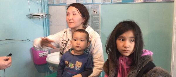 Не успела подумать, как на нас обрушился дом - пострадавшая кыргызстанка - Sputnik Литва