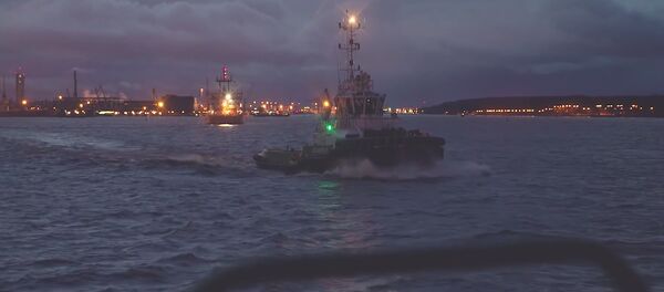 Впервые в Литве СПГ перегрузили на корабль малого объема Впервые в Литве СПГ перегрузили на корабль малого объема - Sputnik Литва