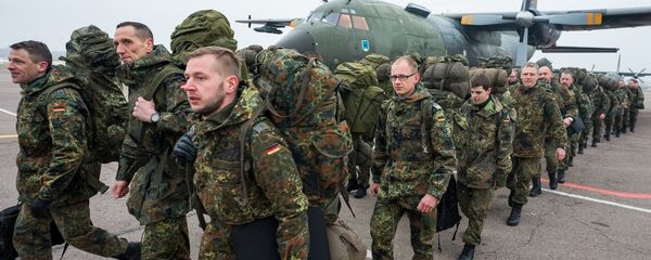 Немецкие военные на учениях НАТО в Литве Немецкие военные на учениях НАТО в Литве - Sputnik Литва