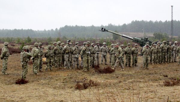 Военные учения НАТО на полигоне Адажи в Латвии. Архивное фото - Sputnik Литва